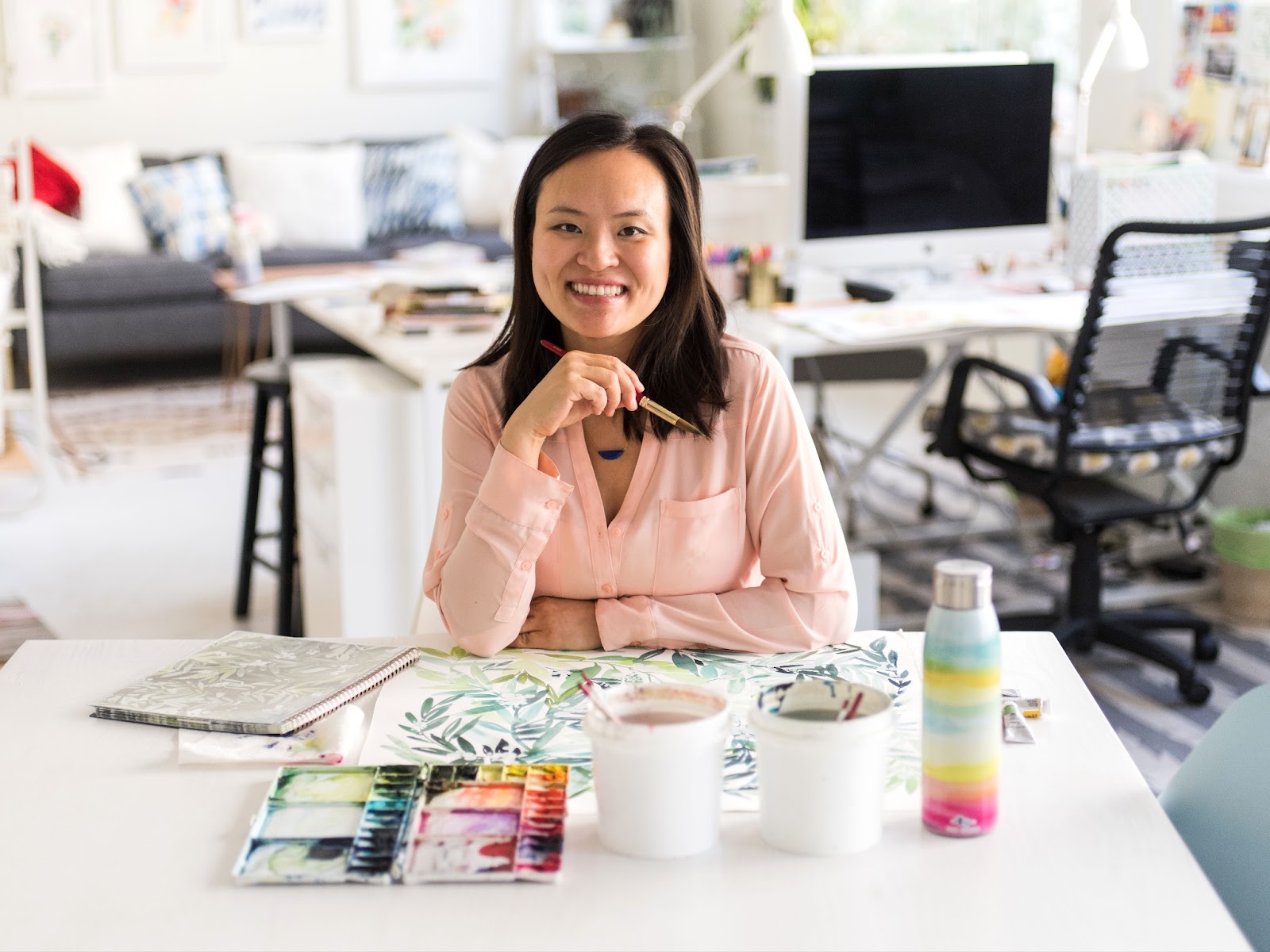 Watercolor Artist & Designer, Yao Cheng, in her studio